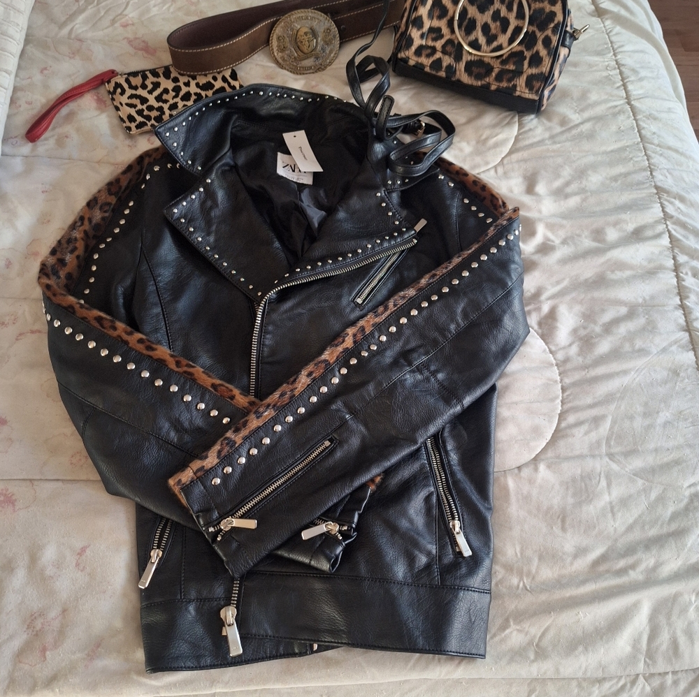 Zara leather moto jacket,  leopard crossbody bag, and leopard wristlet package